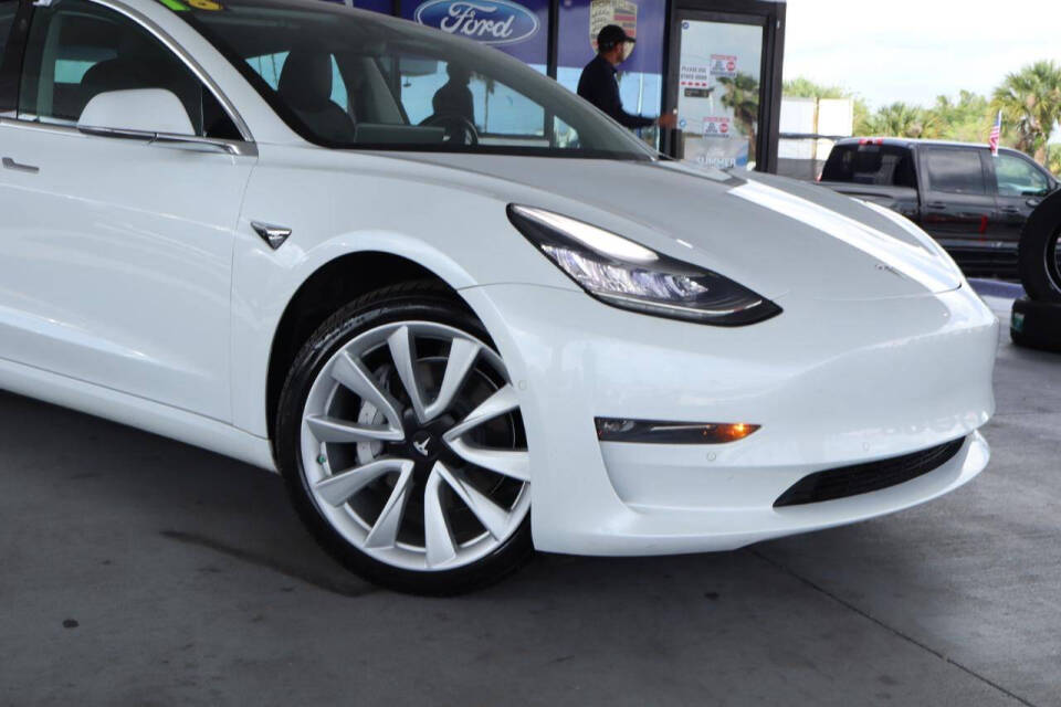tesla model 3 2018 5YJ3E1EA7JF164631 image tesla model 3 2018 5YJ3E1EA7JF164631 image